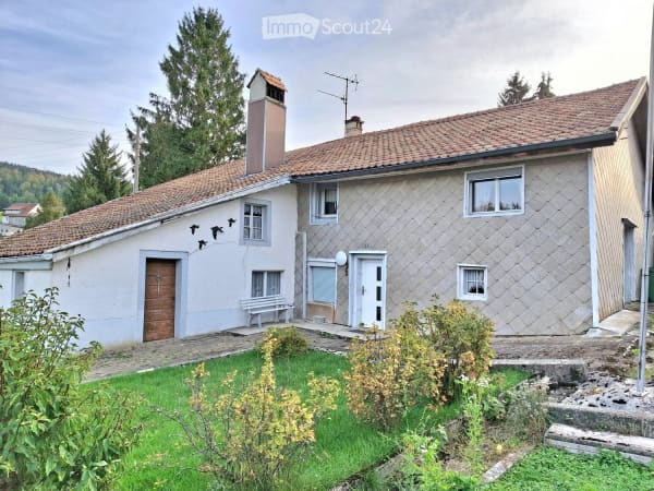 Immobilie in Tramelan - Ancienne ferme jurassienne avec 17 garages et 2 appartements - Bild 1