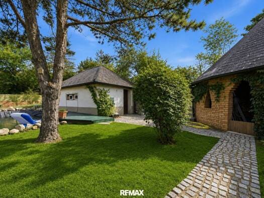 Immobilie in Markgrafneusiedl - Einfamilienhaus zum Kauf - Markgrafneusiedl - 615.000 € - 5,5 Zimmer, 125 m², 1.060 m² Grundstück - Bild 0