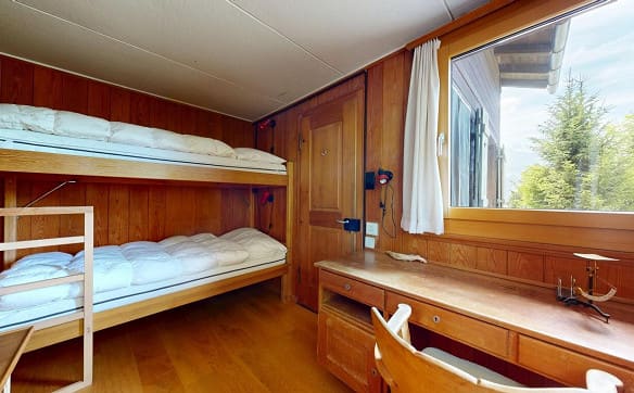 Immobilie in Braunwald - Alpines Chalet mit Einliegerwohnung und traumhafter Bergsicht - Bild 9
