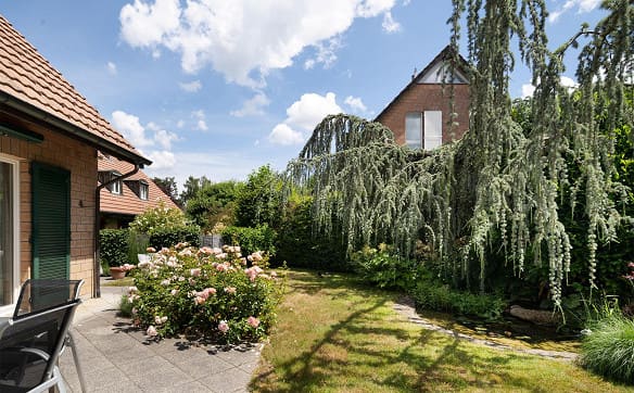 Immobilie in Bottmingen - Einfamilienhaus mit Garten und Garagebox - Bild 2