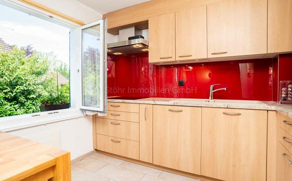 Immobilie in Dorf - 3.5-Zimmerwohnung im Hochparterre mit Balkon und vielseitigen Neben... - Bild 4