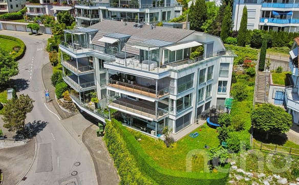 Immobilie in Ennetbürgen - Exklusive Terrassenwohnung mit Panorama-Seesicht - Bild 1