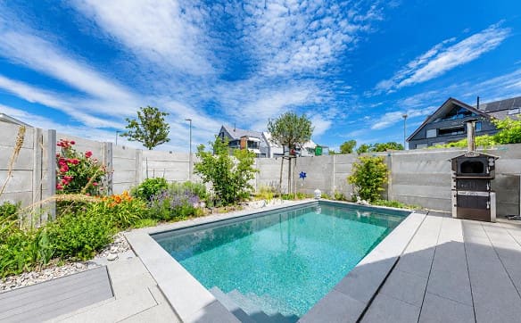 Immobilie in Bottighofen - Traumhafte Doppelhaushälfte mit Garten und Poollandschaft - Bild 1
