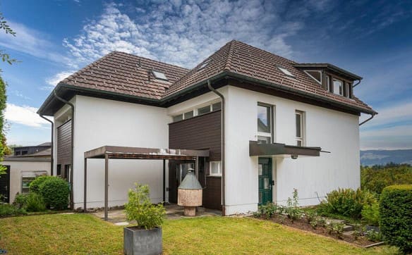 Immobilie in Rüti Zh - Doppel-Einfamilienhaus mit Fernsicht und viel Potenzial - Bild 1