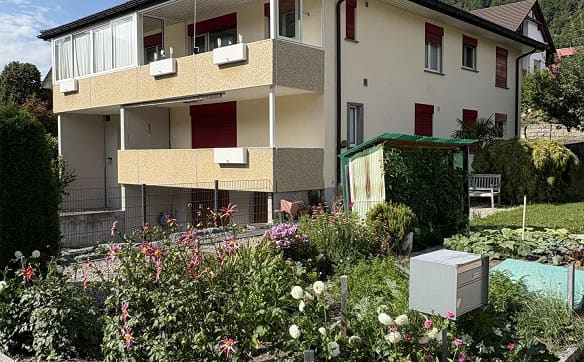Immobilie in Heiligkreuz - Einfamilienhaus mit Einliegerwohnung, Doppel- und WoMo Garage - Bild 1