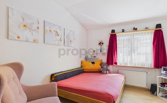 Immobilie in Rhäzüns - Ein Zuhause zum Wohlfühlen mit Gartensitzplatz, Pergola und Gemüseg... - Bild 5