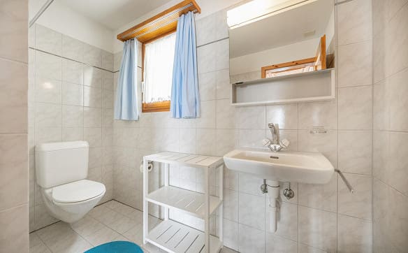 Immobilie in Surcuolm - Ein Feriendomizil zum Geniessen– 5-Zi.-Maisonettewohnung im Chaletstil - Bild 5