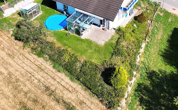 Immobilie in Neuwilen - Grosszügiges 6.5-Zimmer-Einfamilienhaus mit Weitblick, Pool & Wellness - Bild 1