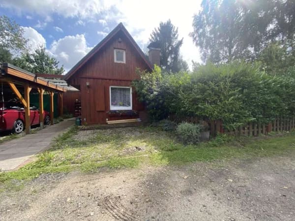 Immobilie in Ottersberg - Otterstedter See: Holzhäuschen mit Carport und Kamin - Bild 1