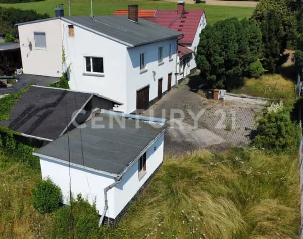 Immobilie in Weida - Doppelhaushälfte mit großem Garten und viel Potenzial! - Bild 1