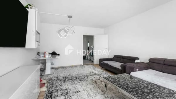 Immobilie in Immenstaad am Bodensee - Lichtdurchflutete Wohnung mit Seeblick und Loggia - Wohnen mit Weitblick in Immenstaad - Bild 1