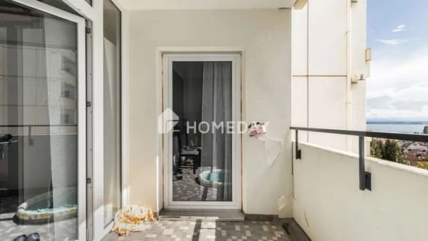 Immobilie in Immenstaad am Bodensee - Lichtdurchflutete Wohnung mit Seeblick und Loggia - Wohnen mit Weitblick in Immenstaad - Bild 3