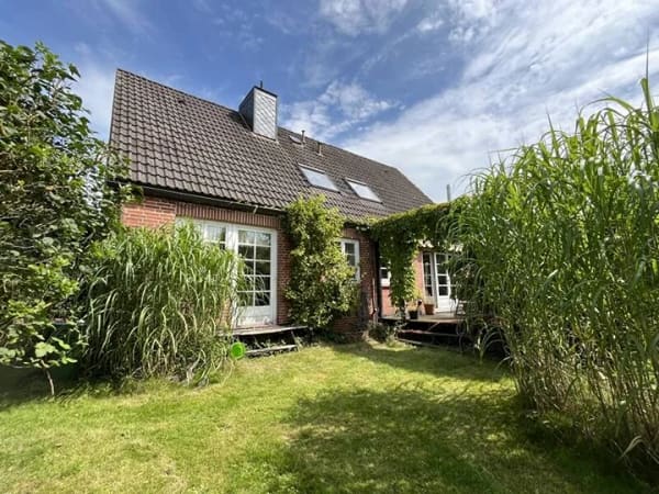 Immobilie in Breitenburg - Idylle pur in bester Lage von Oelixdorf bei Itzehoe - Einfamilienhaus mit ELW und Vollkeller - Bild 3