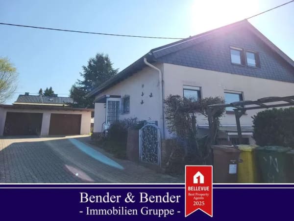 Immobilie in Goddert - Einfamilienhaus mit Garten und zwei Garagen in ruhiger Lage - Bild 1