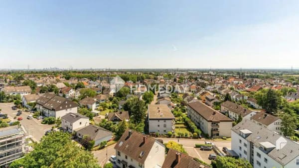 Immobilie in Kriftel - Modern geschnittene 3-Zimmer-Wohnung mit Südbalkon und Panoramablick auf Frankfurt - Bild 0