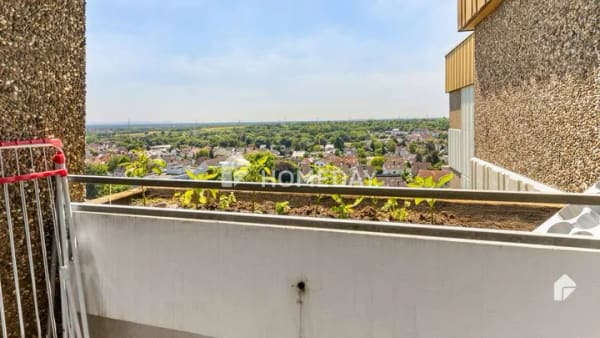 Immobilie in Kriftel - Modern geschnittene 3-Zimmer-Wohnung mit Südbalkon und Panoramablick auf Frankfurt - Bild 2