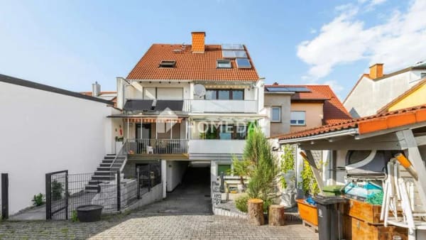 Immobilie in Neulußheim - Mehr Zuhause auf allen Ebenen - DHH mit Loggia, Balkon und wohligem Kaminofen - Bild 1