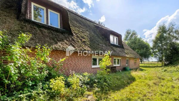 Immobilie in Vollersode - Charakterhaus unter Reet mit großem Garten - Bild 3