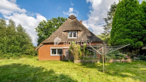 Immobilie in Vollersode - Charakterhaus unter Reet mit großem Garten - Bild 4