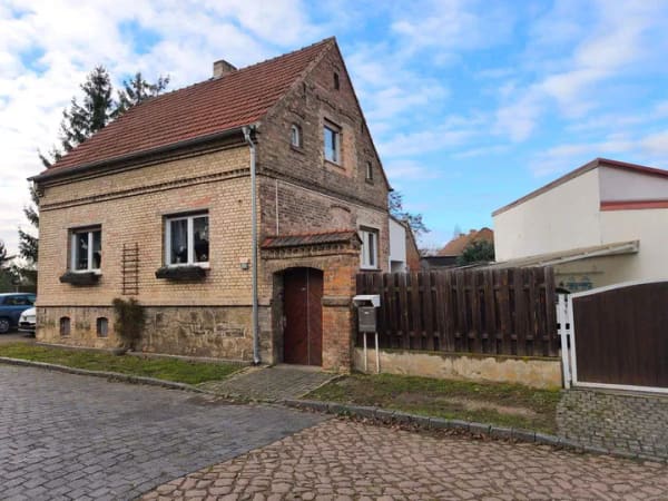 Immobilie in Seegebiet Mansfelder Land - Charmantes Einfamilienhaus mit Carport, Garage & Nebengelass - Bild 1