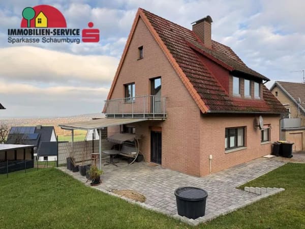 Immobilie in Porta Westfalica - Naturnahes Wohnglück mit Panoramablick: Freistehendes Zweifamilienhaus mit XL-Garten  - Bild 0