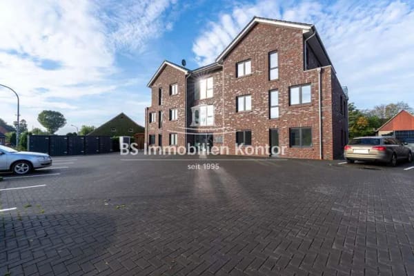 Immobilie in Esterwegen - Neubau-OG Wohnung Nr. 05 mit PKW-Stellplatz und Terrasse in bevorzugter Lage! - Bild 1