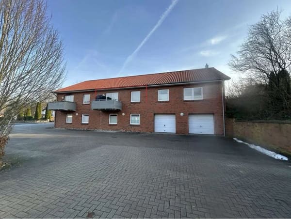 Immobilie in Süderbrarup - Gepflegte 2-Zimmer-Wohnung mit barrierefreiem Zugang, Balkon und Garage in Süderbrarup - Bild 1