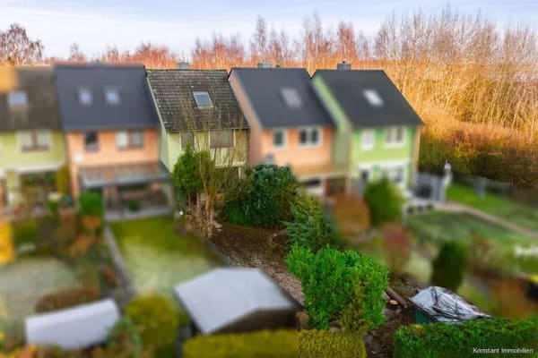 Immobilie in Elmenhorst - Renovierungsbedürftiges Reihenmittelhaus in ruhiger Lage von Schwarzenbek - Bild 0