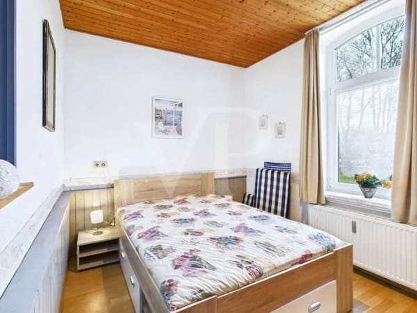 Immobilie in Hagermarsch - Wohnen am Feldrand – Historische Erdgeschosswohnung mit individuellem Gestaltungspotenzial in Hagerm - Bild 1