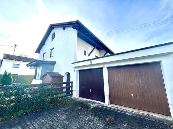 Immobilie in Grasbrunn - Sanierungsbedürftige Doppelhaushälfte mit großem Garten! - Bild 1