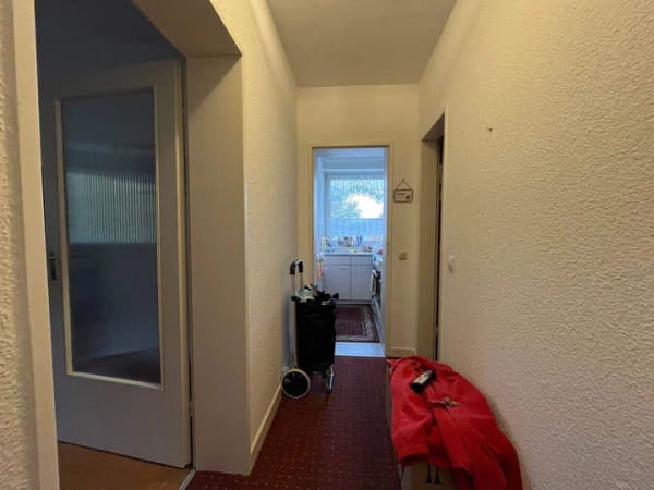 Immobilie in Neumünster - Vermietete 1,5-Zimmer-Wohnung mit kleiner Einbauküche, schönem Balkon und Fahrstuhl im beliebten Ruthenberg - Bild 1