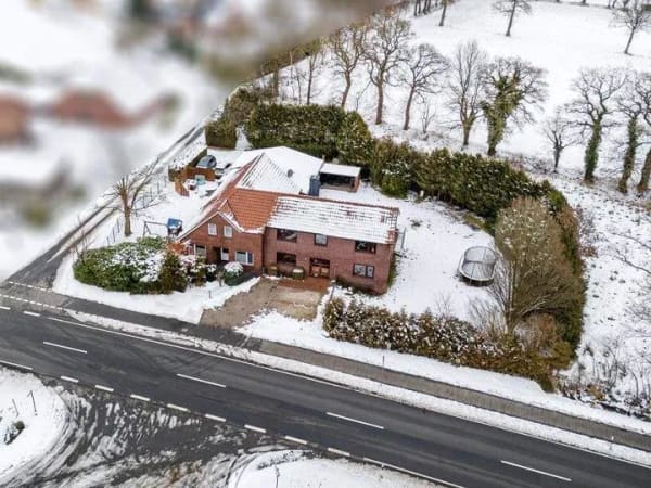 Immobilie in Wittmund - Zwei aneinanderliegende gepflegte Wohnhäuser auf großem Grundstück am Rande von Leerhafe! - Bild 0