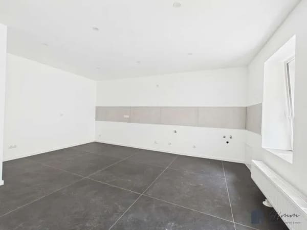 Immobilie in Rheinbrohl - Modernisiertes Reihenhaus in Rheinbrohl – Wohnen mit Rheinblick und Familienkomfort! - Bild 2