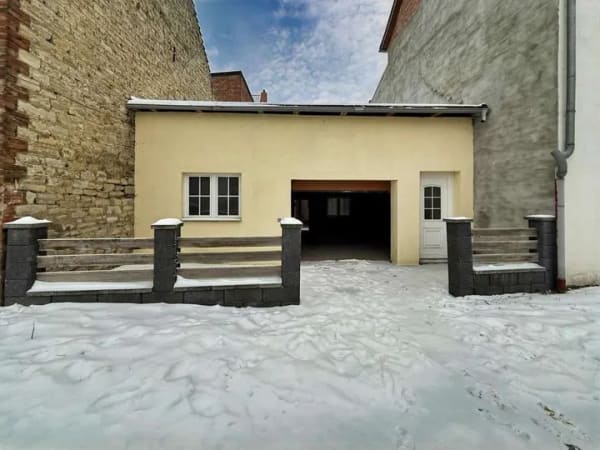 Immobilie in Gröningen - „Kompakt wohnen, großzügig parken – Reihenmittelhaus in Gröningen“ - Bild 1