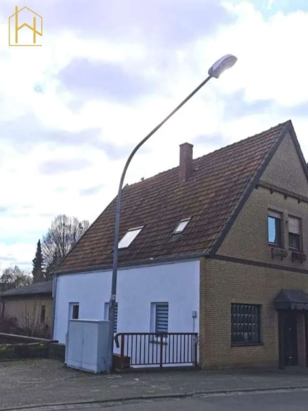 Immobilie in Melle - Solides Ein-bis Zweifamilienhaus mit gesicherten Mieteinnahmen und Eigennutzungspotenzial - Bild 0