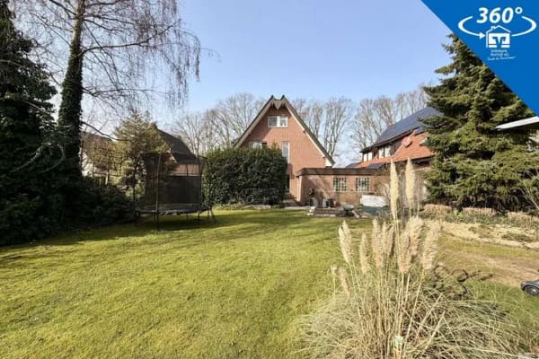 Immobilie in Rhede - Ihr Wohlfühlort in Rhede: 
Maisonettewohnung mit traumhaft großem Eigengarten
 - Bild 0