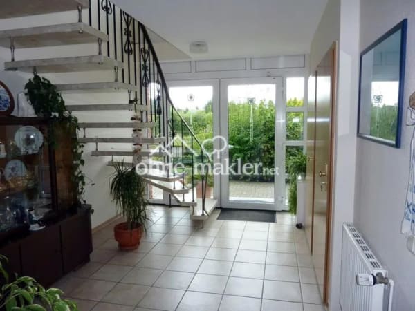 Immobilie in Hesel - Helle Erdgeschosswohnung mit Terrasse und Garten: Gemütliches Wohnen auf einer Ebene! - Bild 1