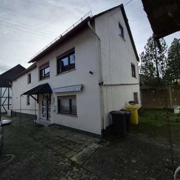 Immobilie in Singhofen - Charmantes Wohnhaus mit Scheune und großem Garten in Singhofen - Bild 1