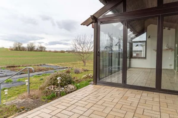 Immobilie in Kraichtal - Großzügiges Mehrgenerationen- oder Einfamilienhaus  mit Wintergarten und unvergleichbarem Ausblick - Bild 0