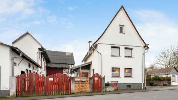Immobilie in Hungen - Einfamilienhaus mit Scheune und Nebengebäuden in ruhiger Lage - Bild 2