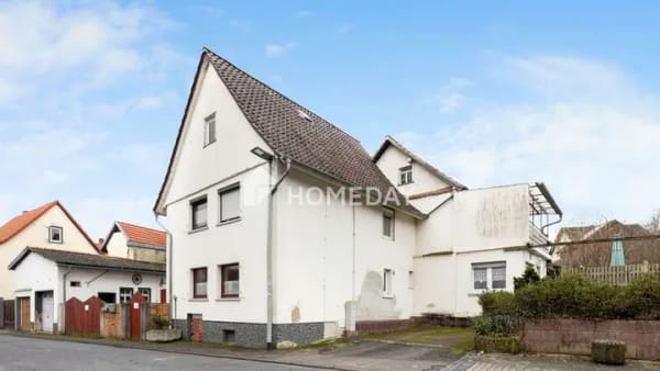 Immobilie in Hungen - Einfamilienhaus mit Scheune und Nebengebäuden in ruhiger Lage - Bild 4