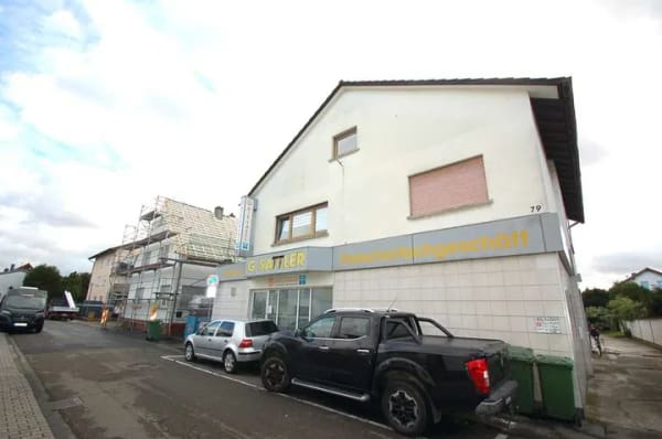 Immobilie in Bürstadt - Mehrfamilienhaus mit Ladengeschäft in ruhiger und beliebter Lage - Bild 0