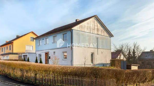 Immobilie in Volkach - Familienfreundliches Einfamilienhaus mit 7 Zimmern und zwei Garagen in Gaibach - Bild 1