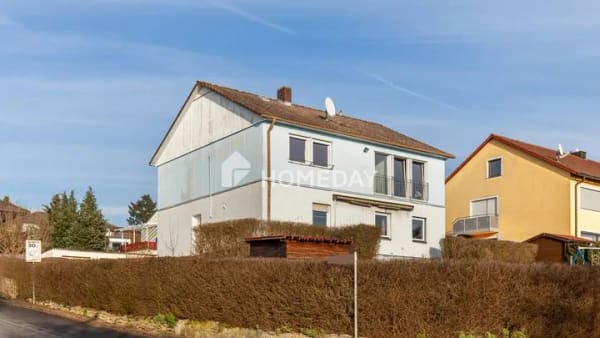 Immobilie in Volkach - Familienfreundliches Einfamilienhaus mit 7 Zimmern und zwei Garagen in Gaibach - Bild 2