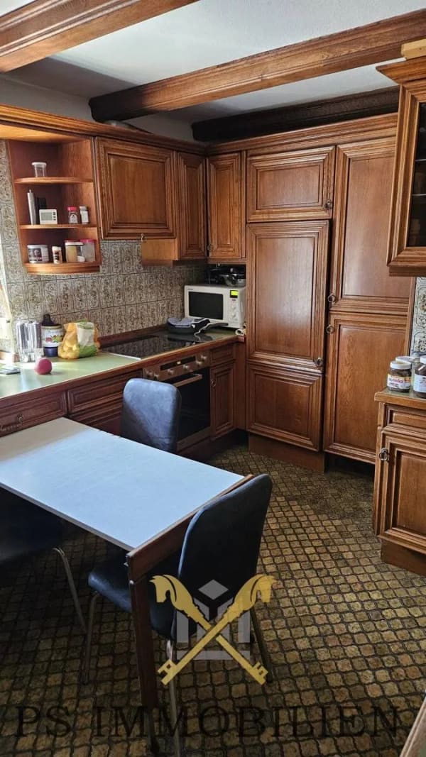 Immobilie in Gönnebek - Gemütliches Wohnhaus mit großzügiger Gewerbeeinheit und Baugrundstück wartet auf Ihre Ideen - Bild 3