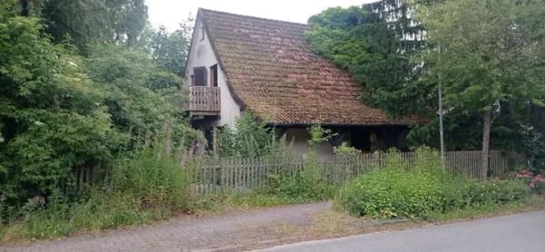 Immobilie in Bad Münder am Deister - Charmantes Einfamilienhaus in idyllischer Lage von Bad Münder mit eigener Wasserquelle - Bild 1
