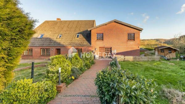 Immobilie in Ascheffel - Gepflegtes Mehrfamilienhaus mit 3 Wohneinheiten und zusätzlichem Potenzial - Bild 4