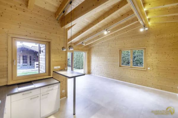 Immobilie in Bayerbach b. Ergoldsbach - Attraktiver KFW40-Holzmassivbungalow mit 2 Zimmern, PV, Garten, Stellplatz und moderner Ausstattung - Bild 0