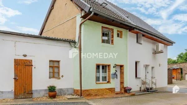 Immobilie in Langerwehe - Charmantes Reihenmittelhaus in ruhiger Traumlage mit schönem Garten - Bild 0