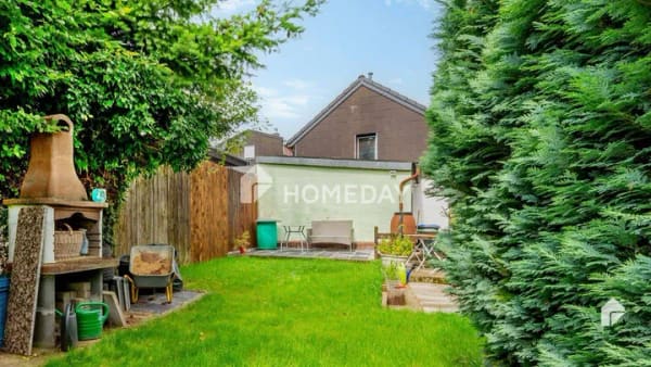 Immobilie in Langerwehe - Charmantes Reihenmittelhaus in ruhiger Traumlage mit schönem Garten - Bild 1